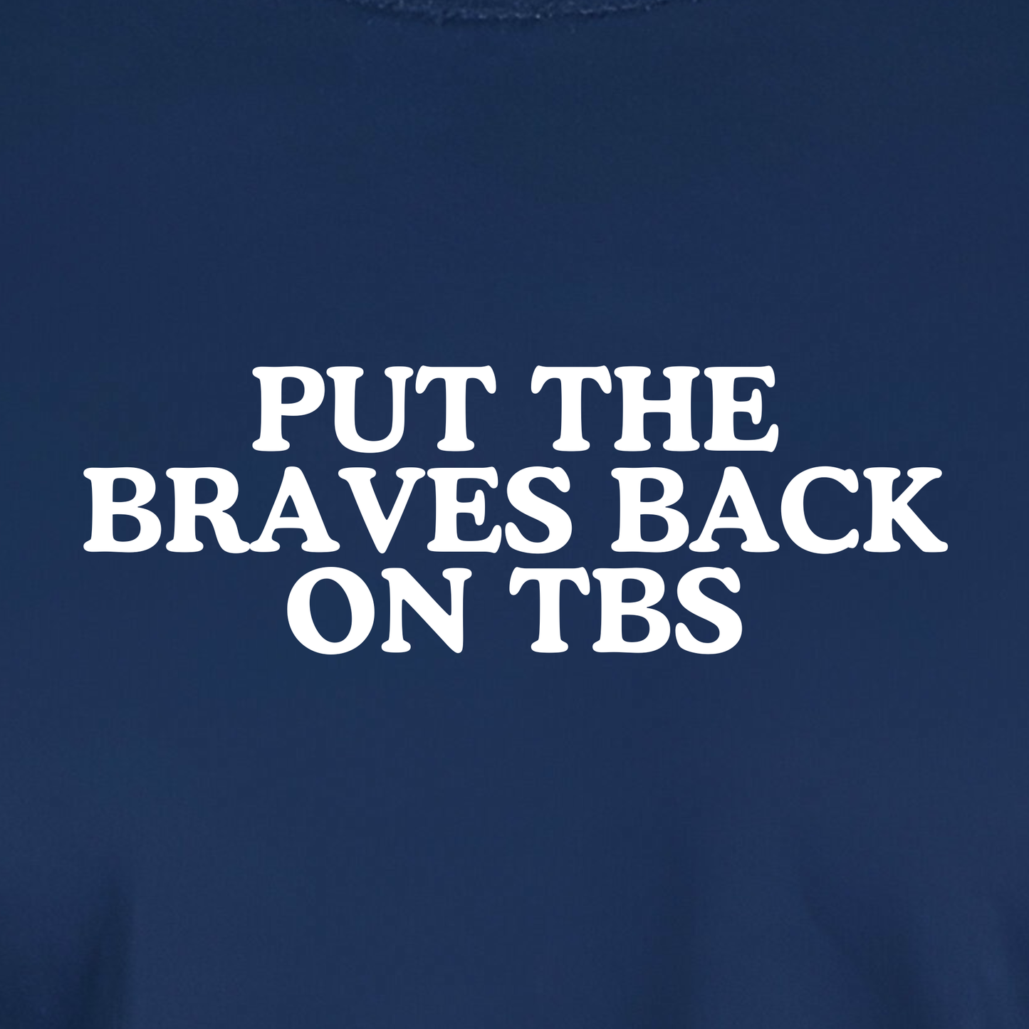 Atlanta baseball shirt design closeup with “Put the Braves Back on TBS” text in white on navy shirt